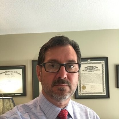 The Law Office of John Harvell : John E. Harvell