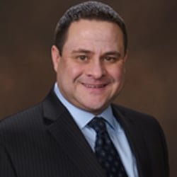 Raymond E. Moore, PC