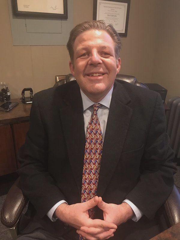 Schneider Law, LLC : Brett A. Schneider