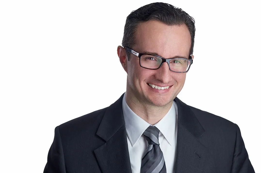 Law Offices of John M. Shari, Esq. : John M. Shari, Esq.